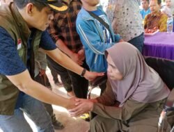 Bupati Erwin Burase Salurkan Bantuan Pangan Pasca Bencana dan Santunan Kematian BPJS Ketenagakerjaan di Parimo